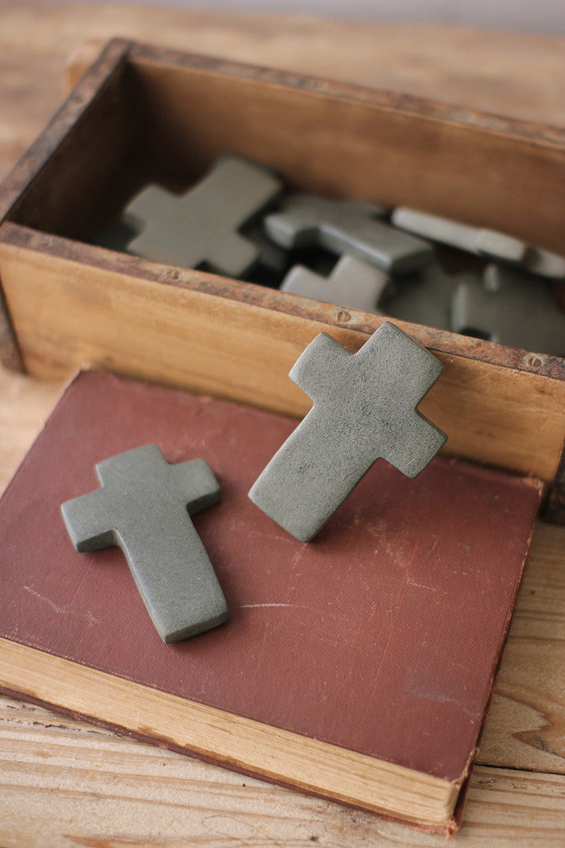 SET OF SIX HAND-CARVED STONE CROSSES - GREY