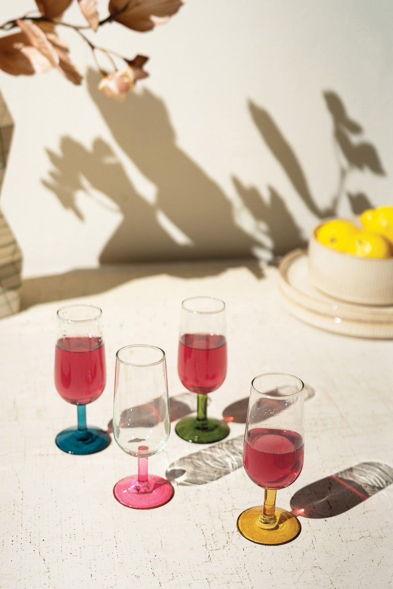 SET OF FOUR APERTIF GLASSES WITH COLORED STEMS