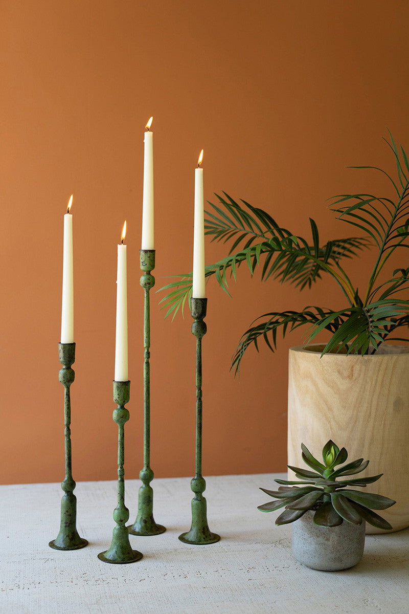 SET OF FOUR FORGED IRON TAPER CANDLE HOLDERS - GREEN PATINA